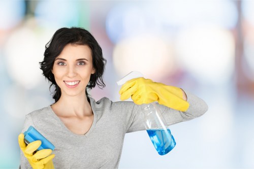Local cleaner vacuuming a flat before tenancy handover in SE23